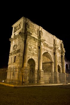 illuminated arc of Constantin in Rome at night