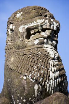 Image of a stone guardian at UNESCO's World Heritage Site of Preah Ko, located at Siem Reap, Cambodia.