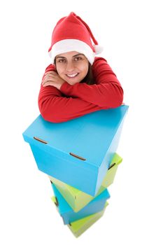 young santa woman posing with pile of present boxes isolated on white background