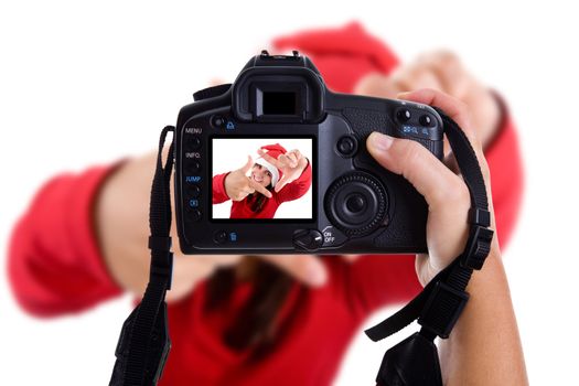 Girl taking photos to a young santa woman in christmas holidays. isolated on white. landscape orientation.