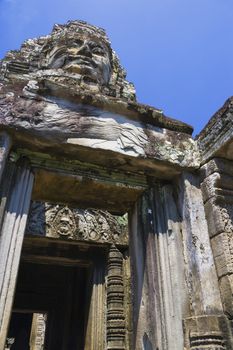 Image of UNESCO's World Heritage Site of Bayon, which is part of the larger temple complex of Angkor Thom, located at Siem Reap, Cambodia. This is one of the temples in Siem Reap where the Hollywood movie Lara Croft Tomb Raider was filmed at.