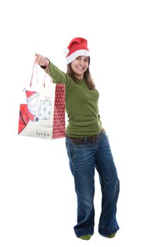 young santa woman celebrating christmas holiday holding present bag. isolated on white background. portrait orientation.