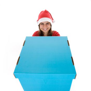 Christmas concept with young santa woman holding giant blue present box isolated on white background