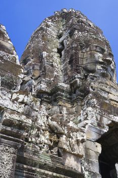 Image of UNESCO's World Heritage Site of Bayon, which is part of the larger temple complex of Angkor Thom, located at Siem Reap, Cambodia. This is one of the temples in Siem Reap where the Hollywood movie Lara Croft Tomb Raider was filmed at.