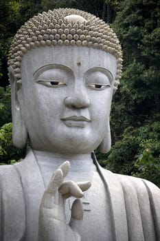 Giant granite Buddha statue in Malaysia.