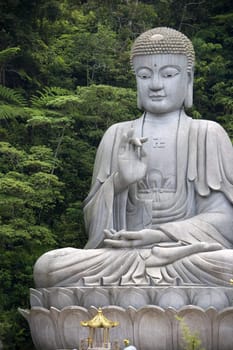 Giant granite Buddha statue in Malaysia.