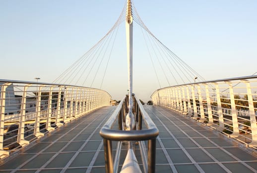 hanged bridge under sunset sky