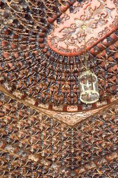 Image of an intricately done wooden ceiling of a Chinese temple in Malaysia.