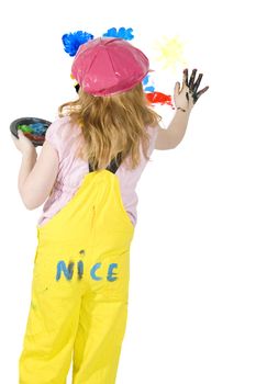 little girl is painting on a white paper isolated