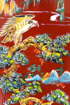 Traditional artwork on a Chinese temple wall in Malaysia.