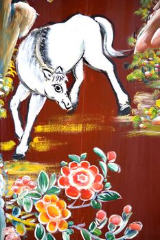 Traditional artwork on a Chinese temple wall in Malaysia.