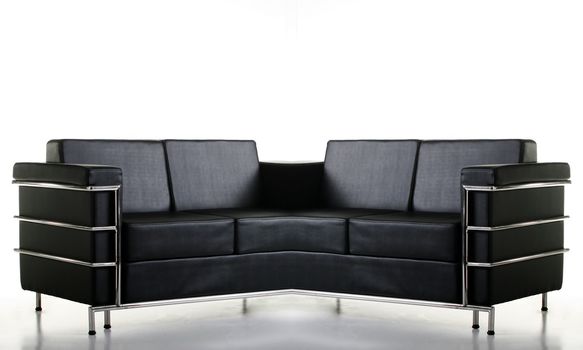 A black leather sofa isolated  on the white background