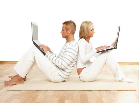 Portrait of a couple sitting in home