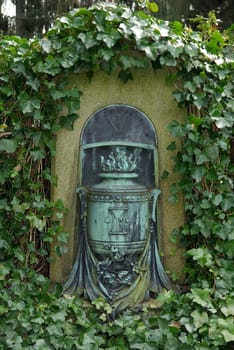 Age gravestone urn motif with