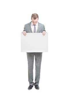 A business man holding an empty sign