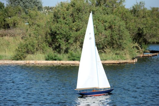 Radio controlled yacht on boating lake