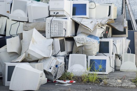 Electronic waste, a large pile of unwanted computer monitors