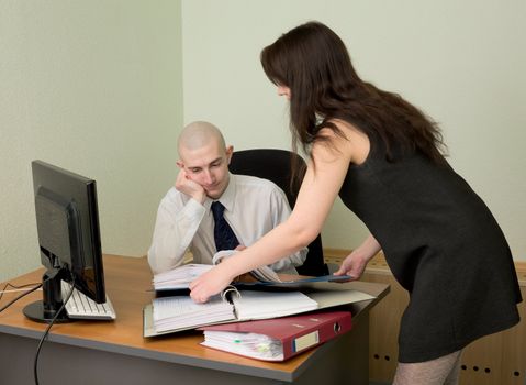 The bookkeeper and the secretary on a workplace at office