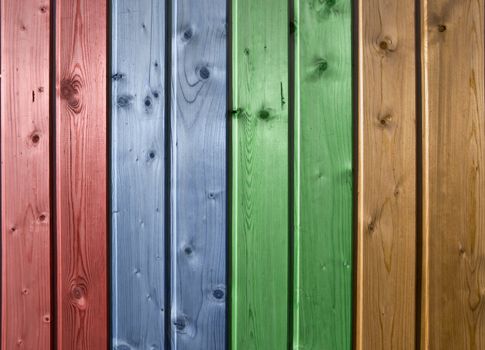 Wall of pine multicolor wood board. Lining closeup, frontally.