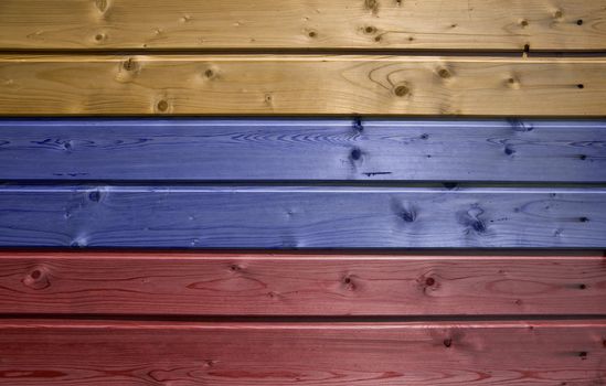 Wall of pine multicolor wood board. Lining closeup, frontally.