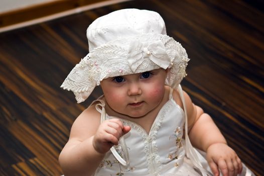 10 months old little girl in nice dress
