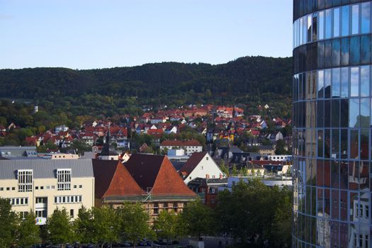 Old German buildings and fragment of modern Jena skyscraper