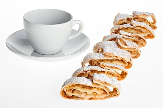 detail of an apple strudel with icing sugar