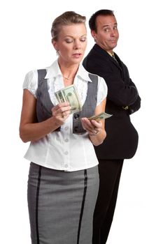 Businesswoman and businessman counting money