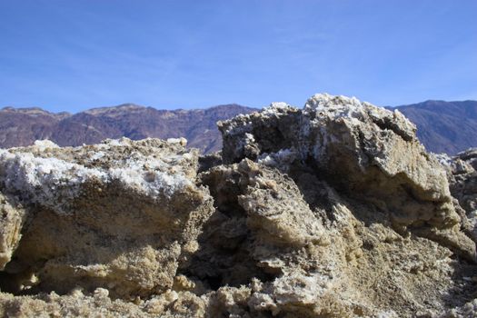 Salt formations with clay mineral deposits in Devil's Golf Course of Death Valley National Park