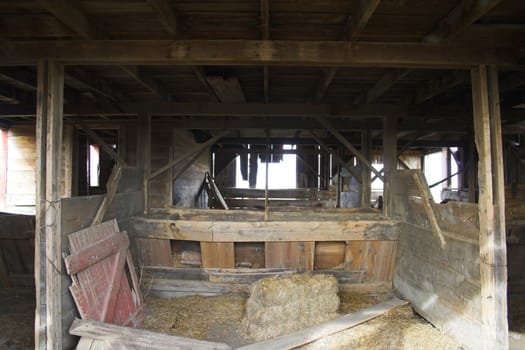 Fragment of farm barn with maize soy and wheat fields  