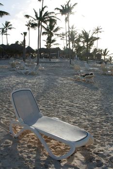 A beach chair on a tropical beach.