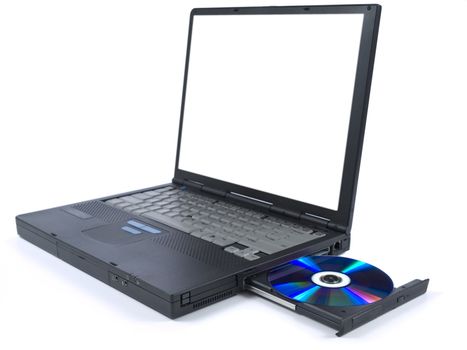 A black laptop with dvd in tray. Isolated over white background. White copy space on screen.