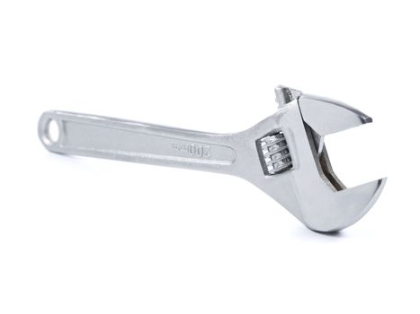 Silver adjustable wrench isolated over white background.