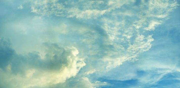 Bright blue skies with light clouds - day