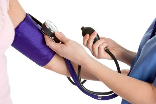 Nurse taking patient blood pressure