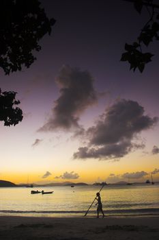 Sunset off the shore at equatorial island. Many of the photos in this series have been filtered using colored filters.