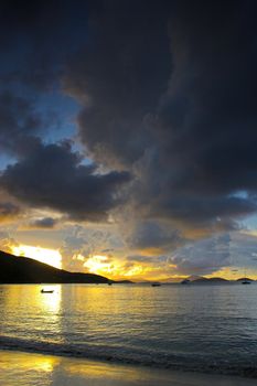 Sunset off the shore at equatorial island. Many of the photos in this series have been filtered using colored filters.