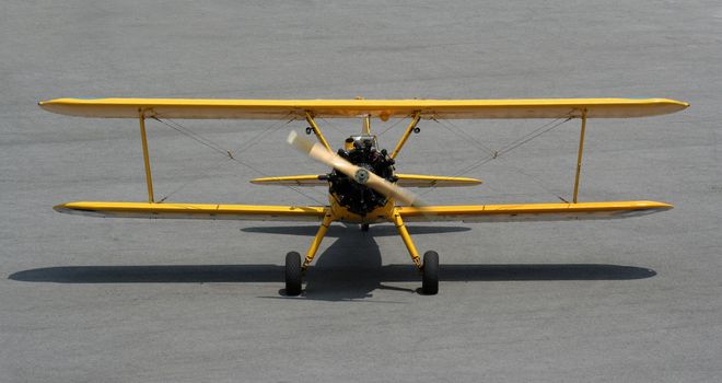 A biplane coming right at the camera.