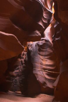 Red sandstone cave-like canyons made with water erosion