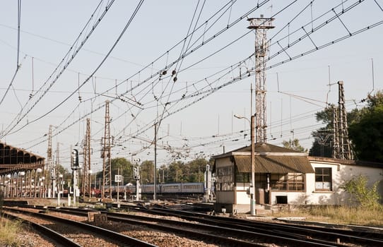 Electrical cables with rails and wagons