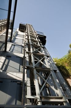 Big city lifts on the side of a building