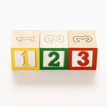 Numbered toy in a line.