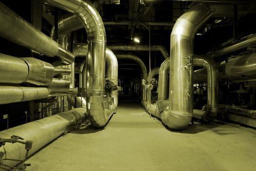 different size and shaped pipes at a power plant             
