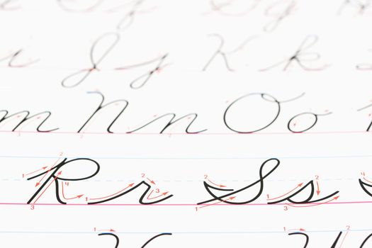 Close up of cursive handwriting practice page.