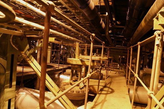 Equipment, cables and piping as found inside of a modern industrial power plant             