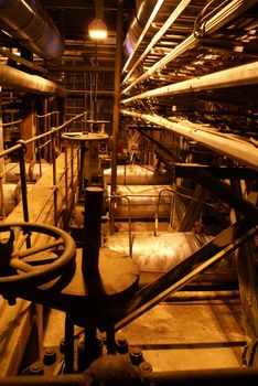  Equipment, cables and piping as found inside of a modern industrial power plant          