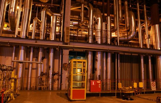 different size and shaped pipes at a power plant          