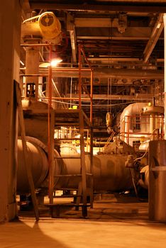 different size and shaped pipes at a power plant         