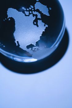 Blue still life of Earth globe showing North America.