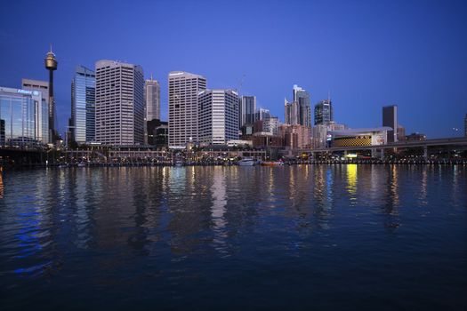 Skyscrapers and Darling Harbour at dusk in Sydney, Australia.